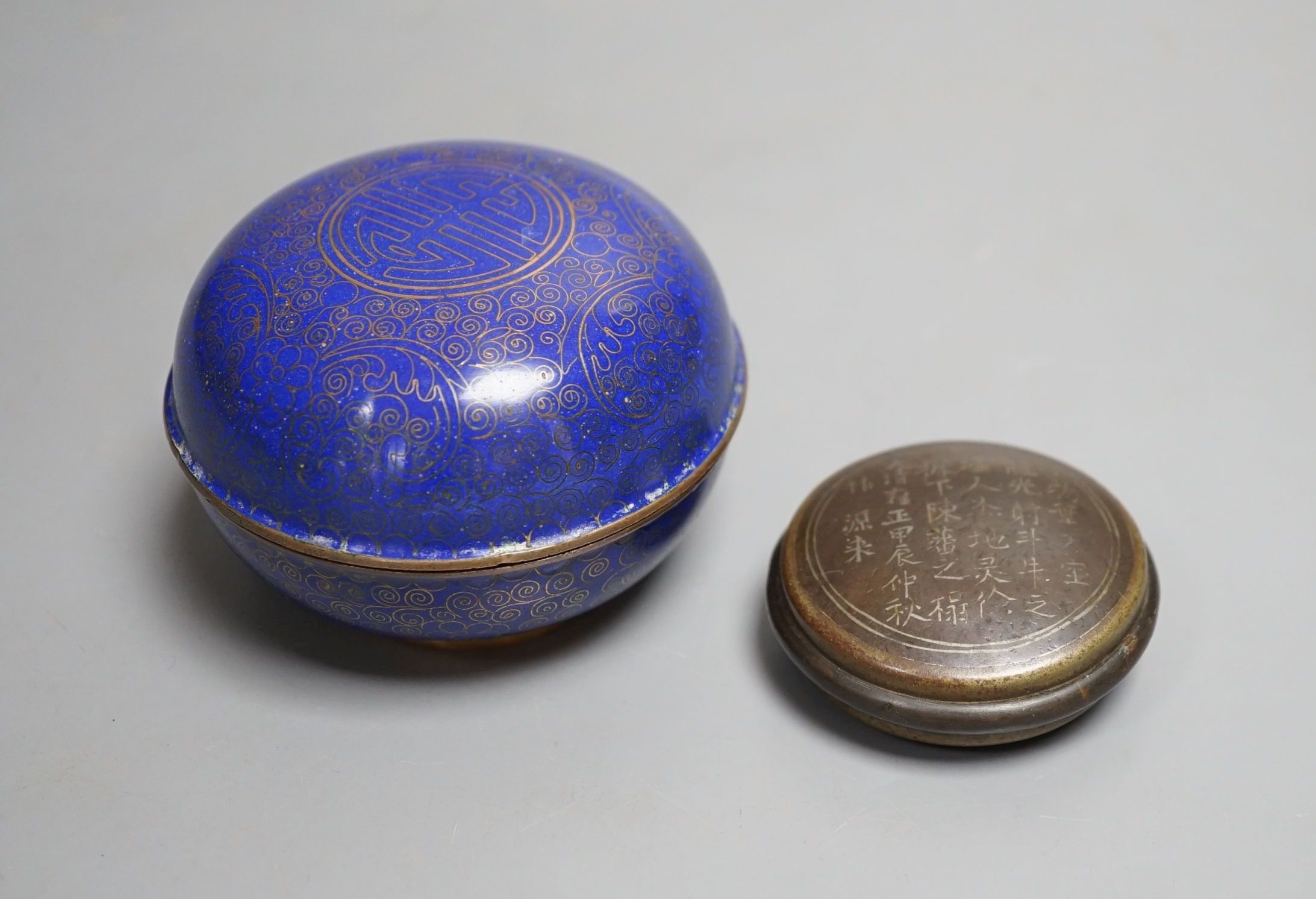 A Chinese white metal wire inlaid bronze seal paste box, 19th century and a cloisonne box, 8cm diameter